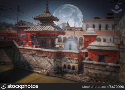 moon. Votive temples and shrines in a row at Pashupatinath Temple, Kathmandu, Nepal.. Pashupatinath Temple