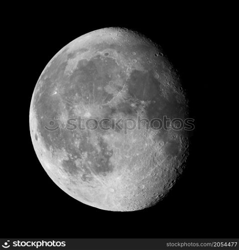 Moon Waning Gibbous 87% phase against black night sky high resolution image