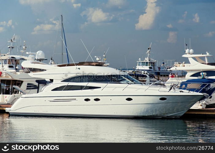 Moored Luxury Motor Yacht in te seaport.