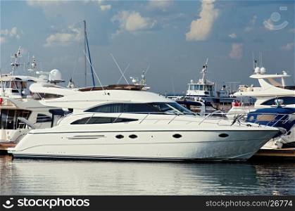 Moored Luxury Motor Yacht in te seaport.