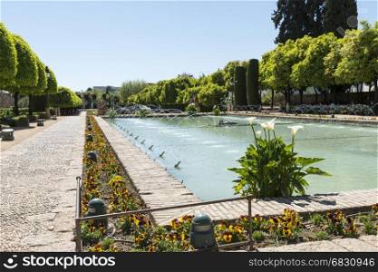 moorish gardens with fountains in alcazar cordoba
