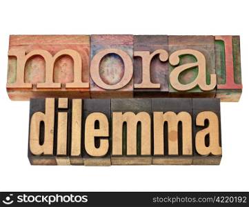 moral dilemma - ethics concept - isolated text in vintage letterpress wood type