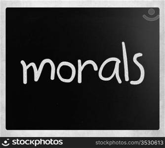 ""Morals" handwritten with white chalk on a blackboard"