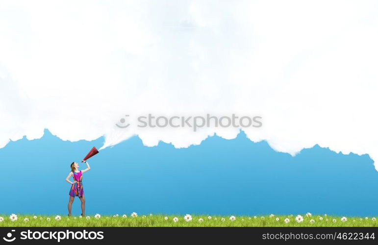 More colors. Young girl in multicolored bright dress with megaphone