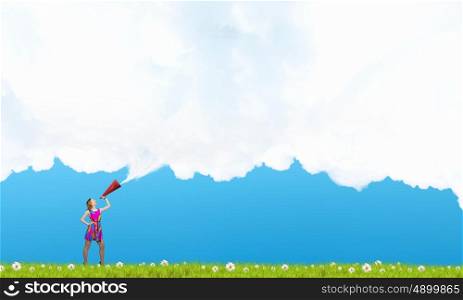 More colors. Young girl in multicolored bright dress with megaphone