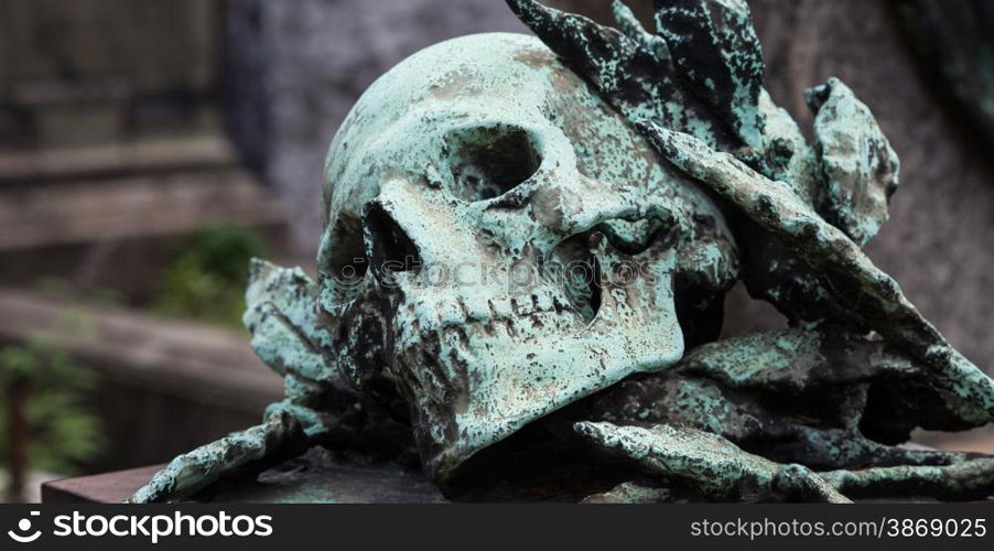 More than 100 years old statue. Cemetery located in North Italy.