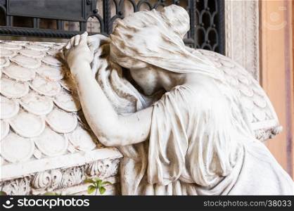More than 150 years old statue. Cemetery located in North Italy.