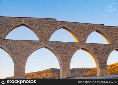 Morella aqueduct in Castellon Maestrazgo at Spain blue sky