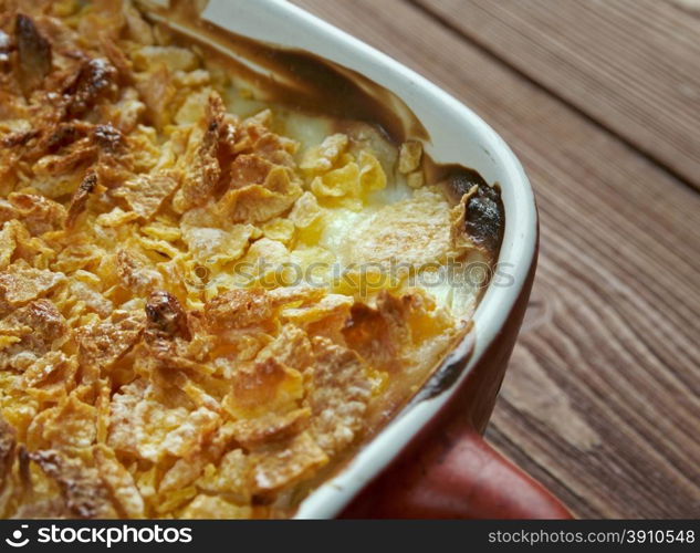 Mormon Funeral Potatoes - traditional potato hotdish, or casserole, un Intermountain West region of the United States. potatoes, cheese , onions, cream soup, cream sauce, sour cream, and corn flakes or crushed potato chips