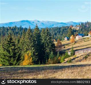 Morning Carpathian mountains and village hamlets on slopes  Yablunytsia village and pass, Ivano-Frankivsk oblast, Ukraine .