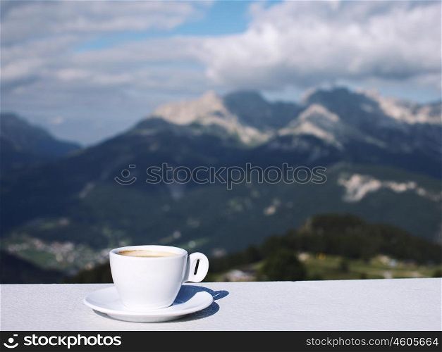 Morning coffe cup with mountain view