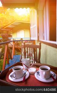Morning coffee in a tropical bungalow, Brazil