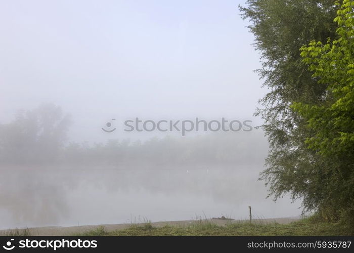 morning fog in loire river, france