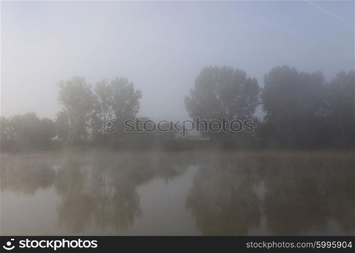 morning fog in loire river, france