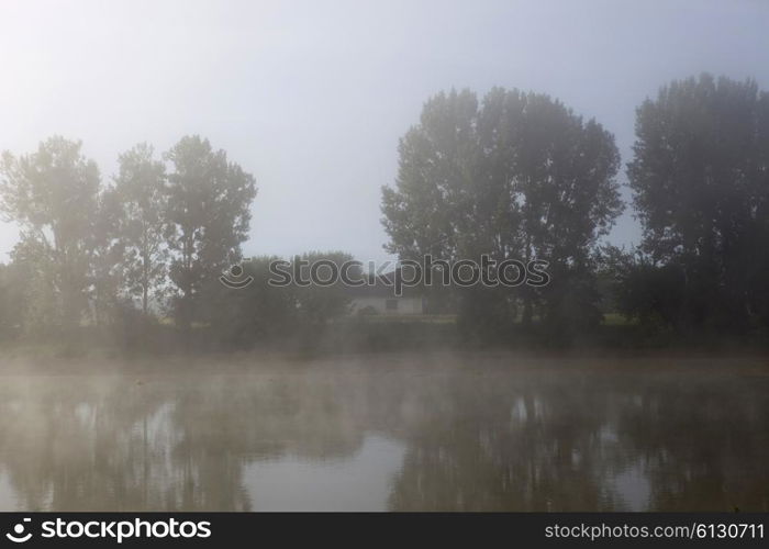 morning fog in loire river, france