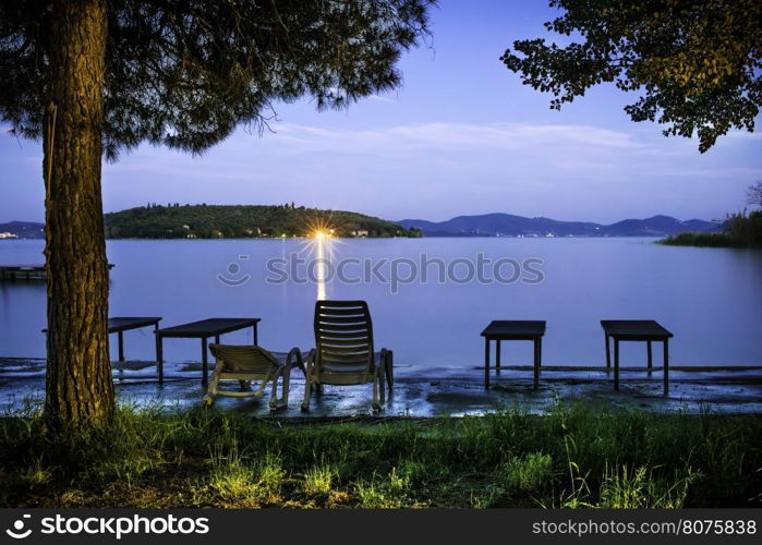 Morning on the shore of a mountain lake. Sunrise