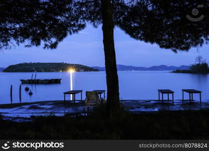 Morning on the shore of a mountain lake. Sunrise