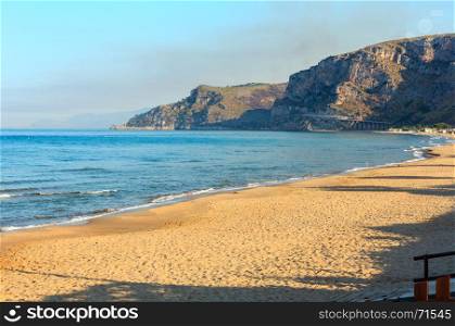 Morning shadows on beautiful Tyrrhenian sea sandy beach (Gaeta, Latina, Italy)