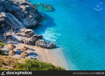 Morning summer Ionian sea coast and beach with transparent aquamarine water, Albania.