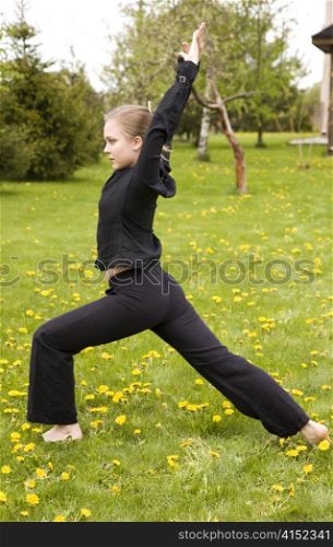 Morning Training. Young Woman Training In The Garden.