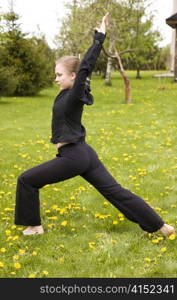 Morning Training. Young Woman Training In The Garden.