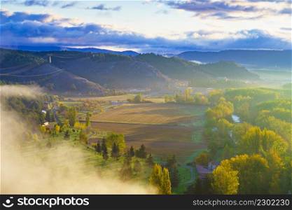 Morning view, fog over valley, Aguilar de Campoo, province of Palencia, Castile and Leon community, northern Spain.. Aguilar de Campoo in Spain.