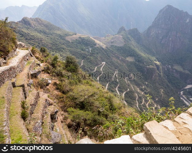 Morning views of Machu Picchu showing terraced hillside
