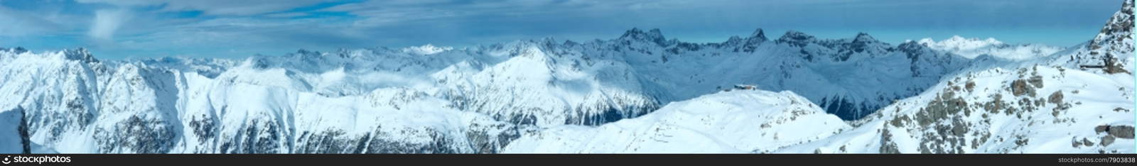 Morning winter Silvretta Alps landscape. Ski resort Silvrettaseilbahn AG Ischgl, Tirol, Austria. Panorama. All people are unrecognizable.