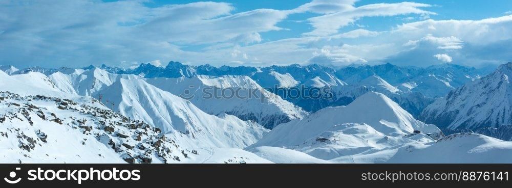 Morning winter Silvretta Alps landscape. Ski resort Silvrettaseilbahn AG Ischgl, Tirol, Austria. Panorama. All people are unrecognizable.