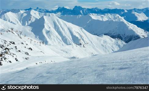Morning winter Silvretta Alps landscape. Ski resort, Tyrol, Austria. All people are unrecognizable.
