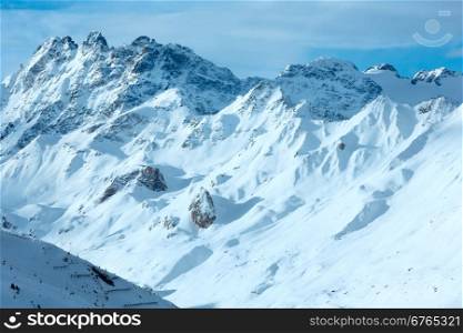 Morning winter Silvretta Alps landscape with ski lift (Tyrol, Austria).