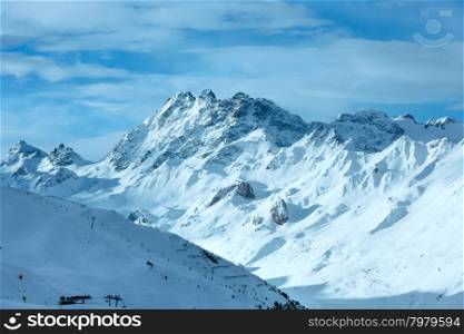 Morning winter Silvretta Alps landscape with ski run and ski lift (Tyrol, Austria).