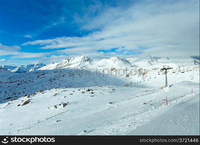 Morning winter windy mountain landscape. Ski resort Molltaler Gletscher, Carinthia, Austria.