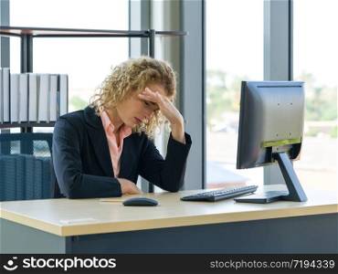 Morning work atmosphere In a modern office. Ukrainian employees rest their eyes due to dizziness and headaches. After clearing the remaining pending work.
