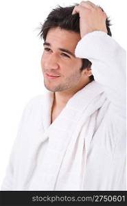 Morning - Young man in bathrobe with towel waking up on white background