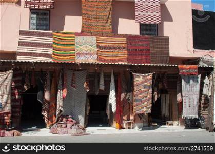 Moroccan building with newly produced Berber carpets in the Medina of Marrakech