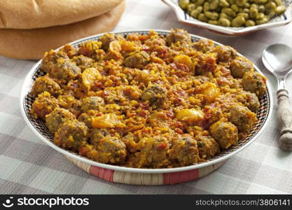 Moroccan dish with kefta sardines and broad beans