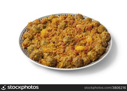 Moroccan dish with kefta sardines on white background