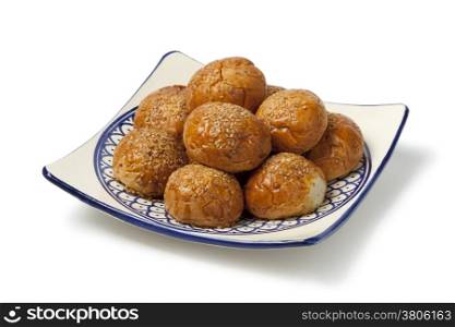 Moroccan krachel on a dish on white background