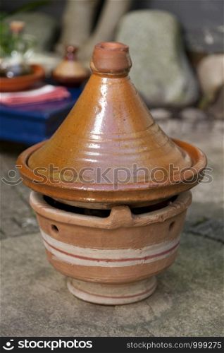 Moroccan stove with tagine in the garden