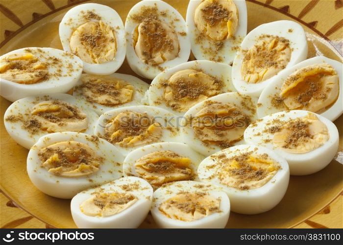 Moroccan traditional boiled eggs with salt and cumin for iftar in ramadan time close up
