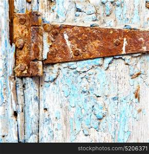 morocco in africa the old wood facade home and rusty safe padlock