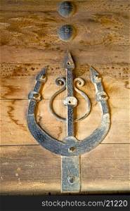 morocco knocker in africa the old wood facade home and rusty safe padlock