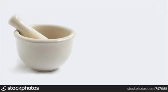 Mortar and pestle on white background. Copy space