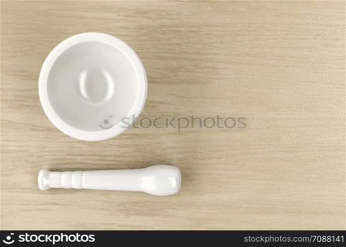 Mortar and pestle on wood table, top view
