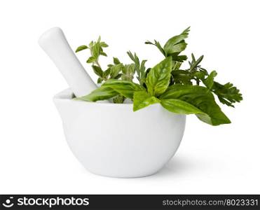 mortar with herbs isolated. mortar with herbs isolated on a white background