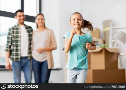 mortgage, family and real estate concept - happy mother, father and little daughter with stuff in boxes moving to new home. happy family with child moving to new home