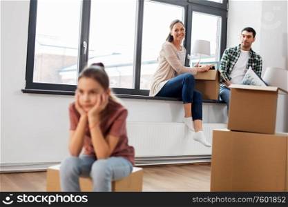 mortgage, family and real estate concept - sad girl moving to new home with mother and father packing things. sad girl moving to new home with her family