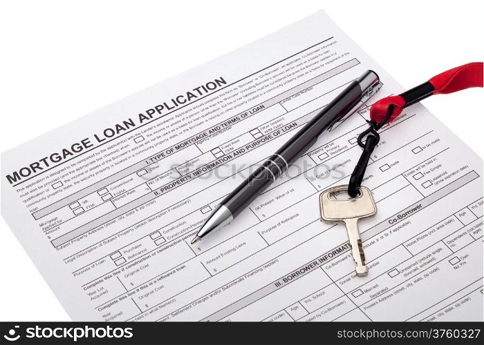 Mortgage loan application with key isolated on white background