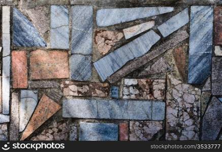 Mosaic stone wall texture. High resolution background